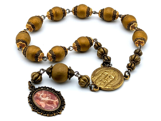 Saint Michael unique rosary beads single decade rosary with golden glass and bronze beads, bronze Holy Face centre medal and Saint Michael picture end medal.