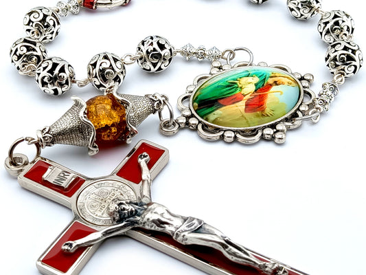 Large red enamel Saint Benedict wall crucifix and single decade Jesus the good Shepard Tibetan silver rosary.