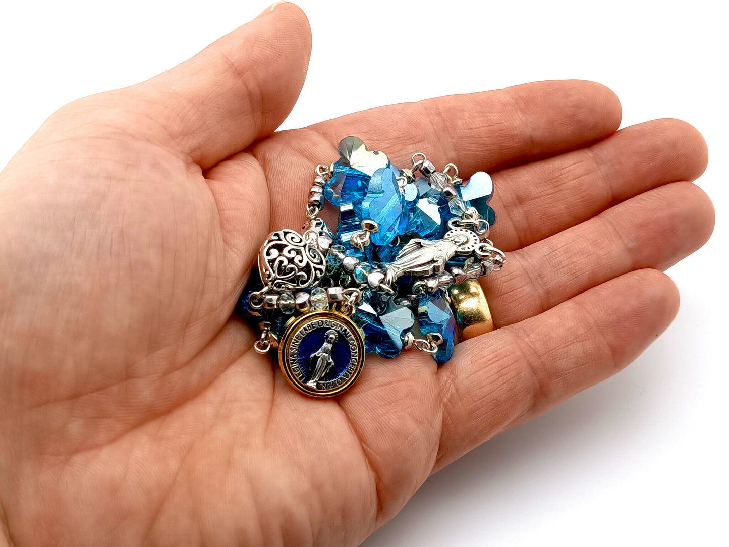 The Immaculate Conception unique rosary beads prayer chaplet with blue crystal and silver filigree heart beads, Our Lady centre medal and Miraculous medal.