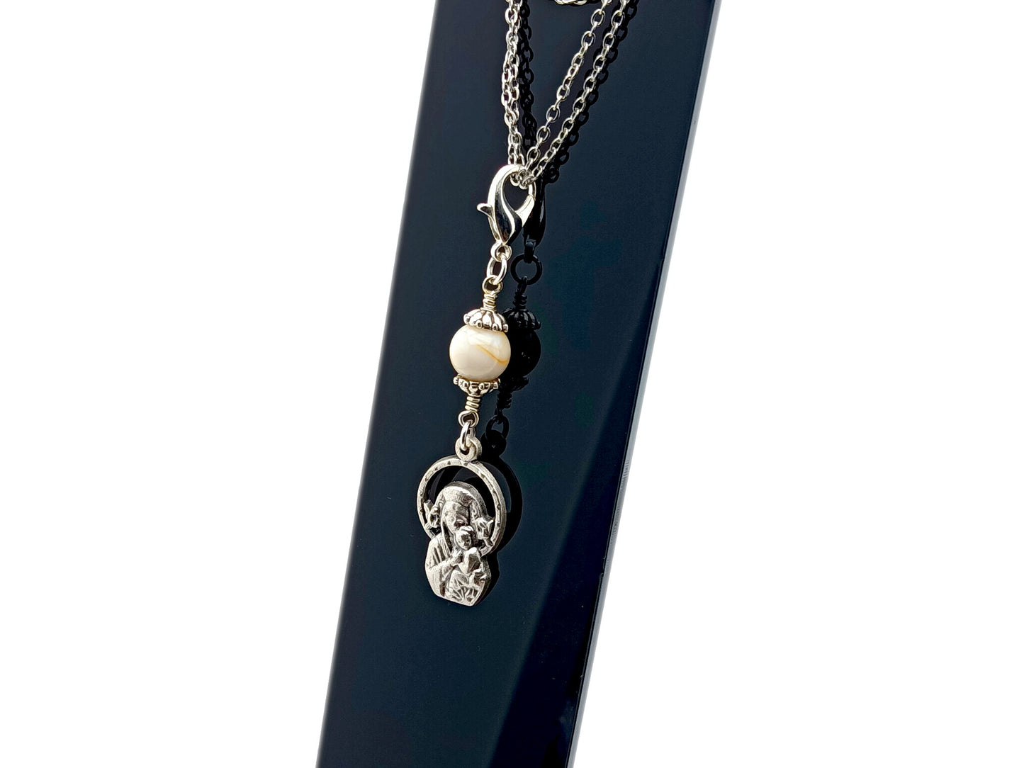 Immaculate Conception unique rosary beads purse clip key chain with mother of pearl bead in unbreakable wire wrapped style with lobster clasp.