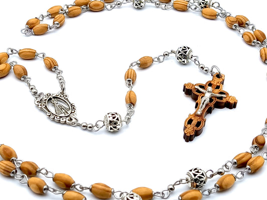 Our Lady of Charity unique rosary beads with wooden and Tibetan silver beads and Jerusalem olive wood laser cut crucifix.