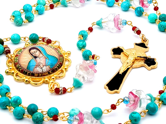Our Lady of Guadalupe unique rosary beads with turquoise gemstone and glass flowers beads and gold and black enamel Saint Benedict crucifix.