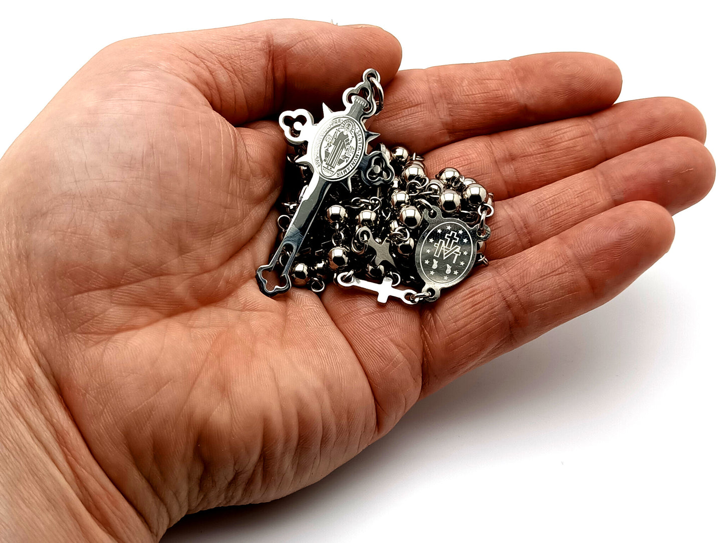 Miraculous medal and Saint Benedict unique rosary beads with stainless steel beads and stainless steel linking cross medals.