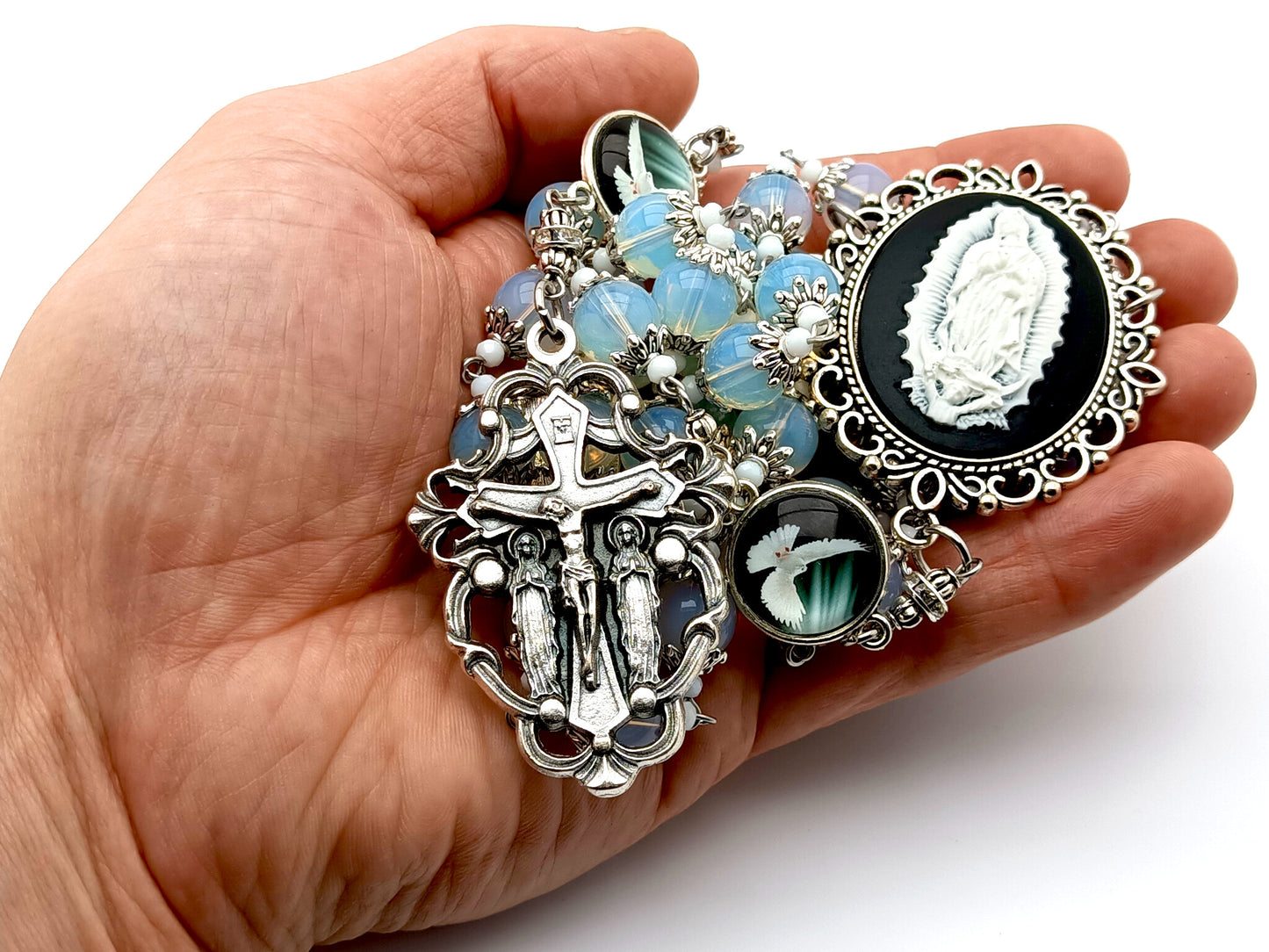 Our Lady of Guadalupe cameo unique rosary beads with opal gemstone beads and Holy Spirit domed picture medals and Holy Angel crucifix.