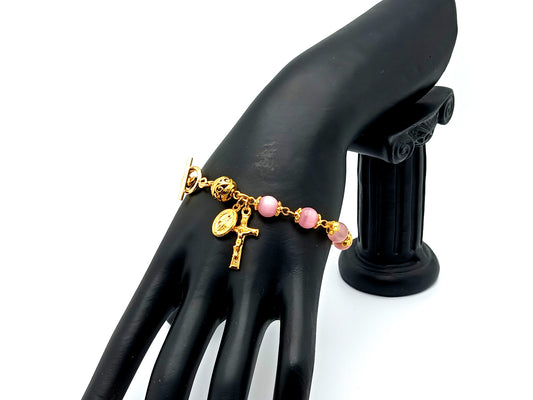 Miraculous medal unique rosary beads gold and pink cats eye single decade rosary bracelet with gold Our Father bead and crucifix.