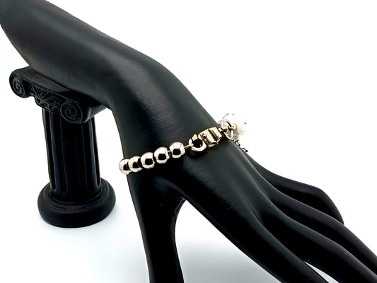 925 sterling silver and stainless steel unique rosary beads single decade rosary bracelet with glass flower bead and 925 sterling silver cross.