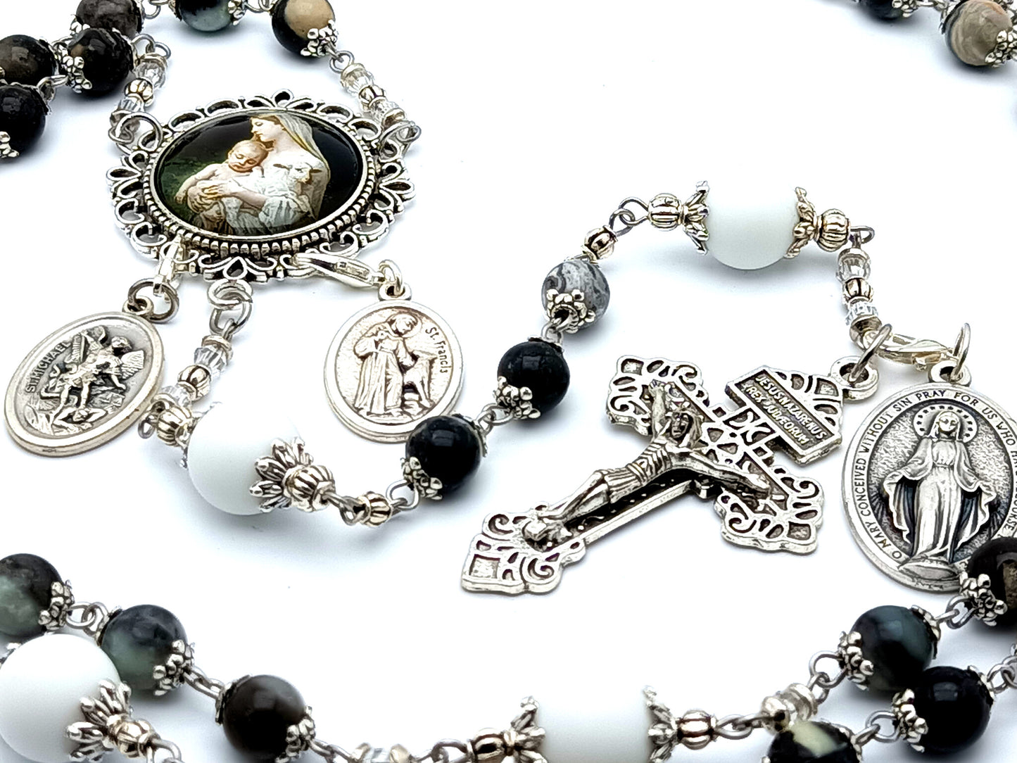Virgin Mary and St Francis unique rosary beads with black and white gemstone beads and pardon crucifix and miraculous medal.