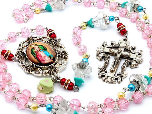Our Lady of Guadalupe unique rosary beads with crackled glass and flower petal rosary beads and filigree crucifix and floral silver medal frame.