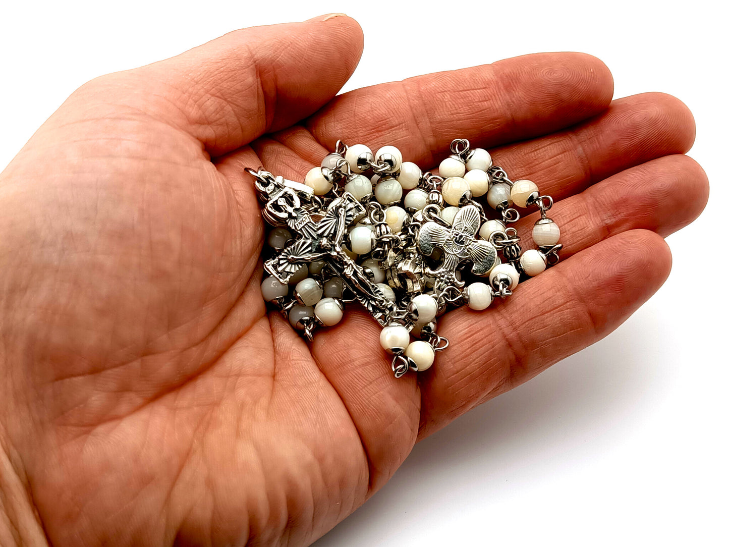Holy Spirit unique rosary beads mother of pearl rosary beads with Holy Ghost crucifix and fleur de lis Saint Bernadette, Saint Therese Miraculous medal center.