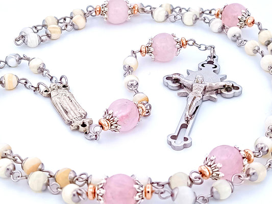 Saint Therese of Lisieux unique rosary beads mother of pearl and rose quartz gemstone rosary beads with Saint Benedict crucifix.