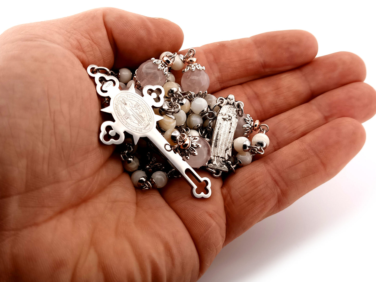 Saint Therese of Lisieux unique rosary beads mother of pearl and rose quartz gemstone rosary beads with Saint Benedict crucifix.