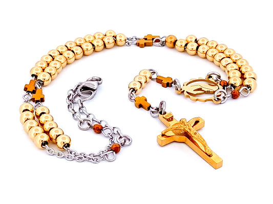 Blessed Virgin Mary unique rosary beads gold plated stainless steel wearable rosary beads with hematite linking cross beads and Saint Benedict crucifix.