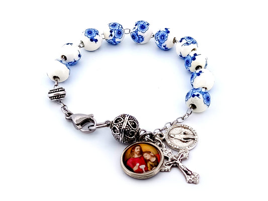 Jesus in the Blessed Sacrament unique rosary beads floral porcelain single decade rosary bracelet with Miraculous medal and small silver crucifix.