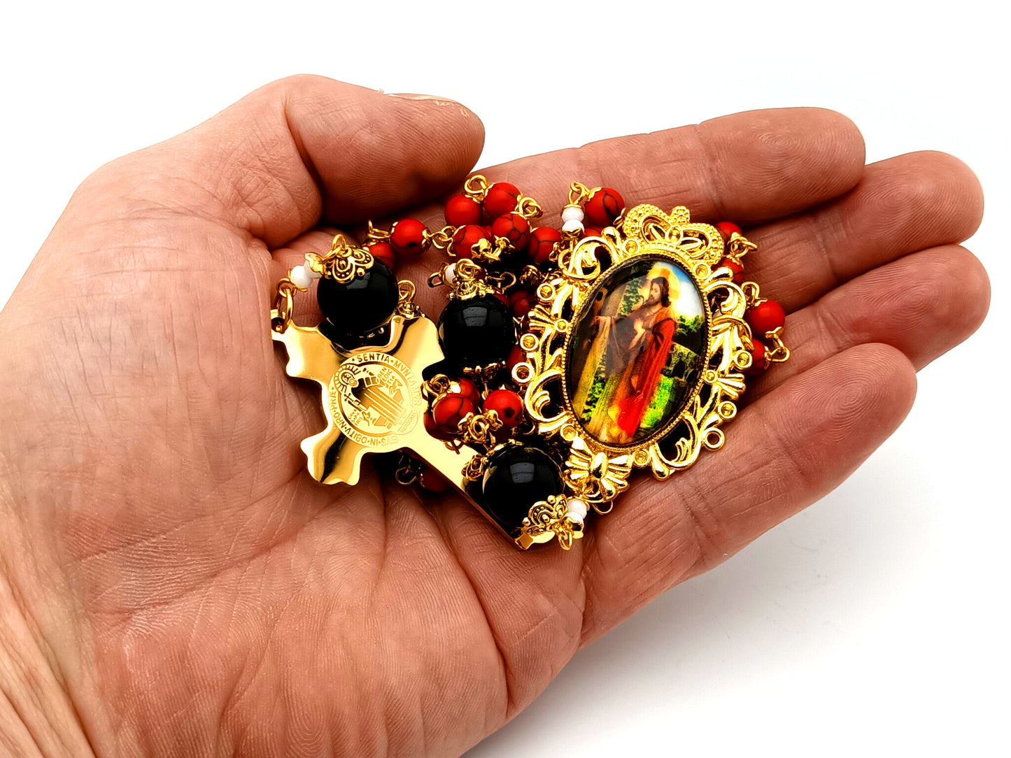 Jesus the Good Shepard unique rosary beads gemstone rosary beads with gold and enamel Saint Benedict crucifix and large onyx beads.