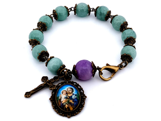 Saint Joseph unique rosary beads antique style aquamarine gemstone single decade rosary bracelet with small brass crucifix.