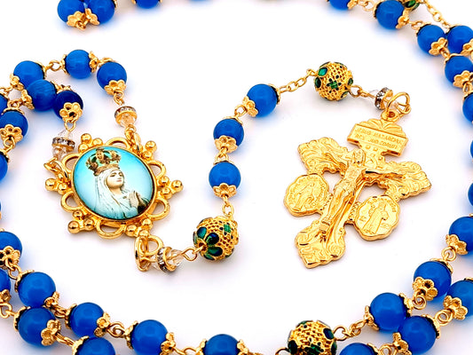 Our Lady Queen of Heaven unique rosary beads blue glass rosary with gold plated pardon crucifix and gold filigree beads.