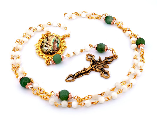 Our Lady of Guadalupe and Saint Juan Diego unique rosary beads mother of pearl rosary beads with Holy Spirit crucifix.