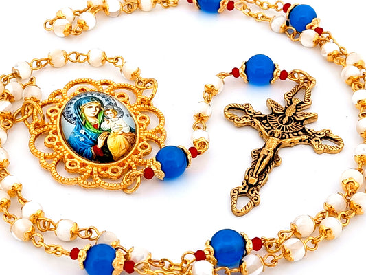 Our Lady of Perpetual Succour unique rosary beads mother of pearl rosary beads with Holy Spirit crucifix.