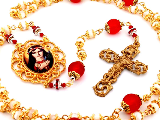 Saint Philomena unique rosary beads ruby gemstone and mother of pearl rosary beads with antique style gold crucifix.