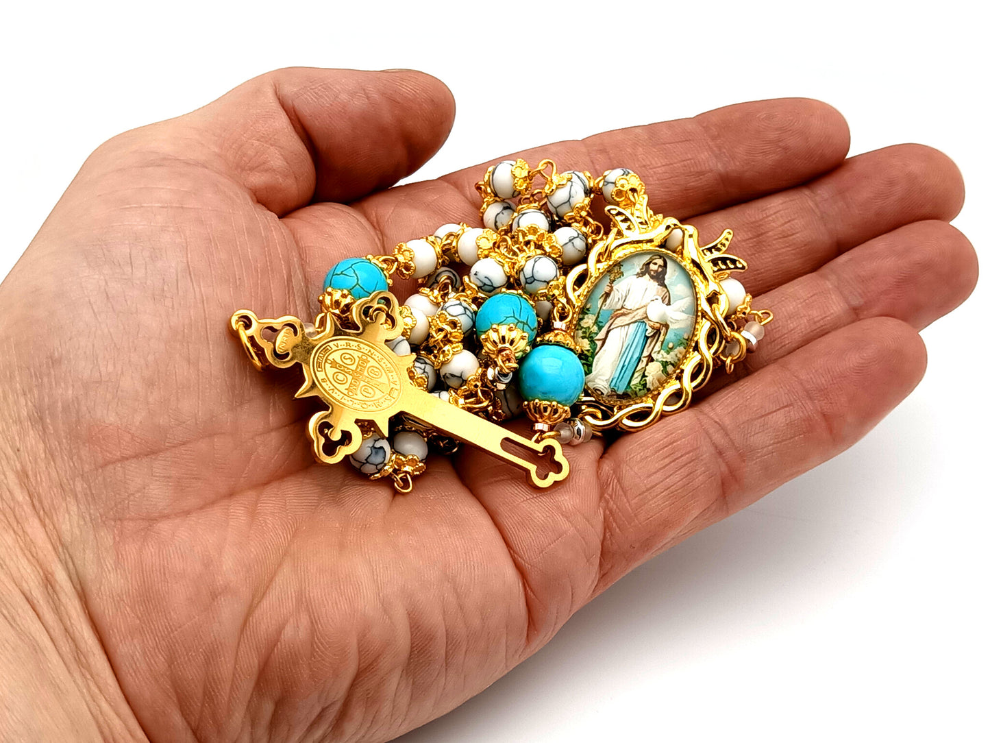 Spirit of Jesus unique rosary beads howlite and turquoise gemstone rosary with gold plated Saint Benedict crucifix.