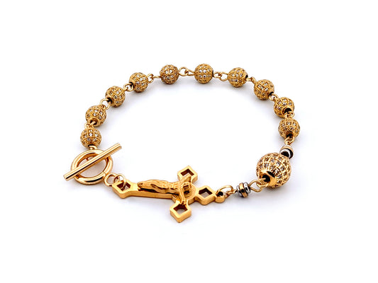 18K Gold cubic zirconia single decade rosary bracelet with gold plated Saint Benedict crucifix.