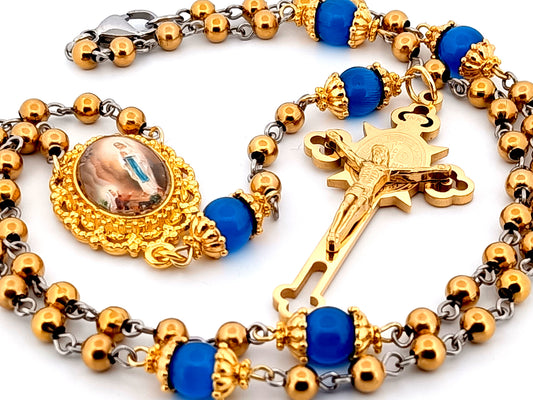 Our Lady of Lourdes unique rosary beads gold plated stainless steel and blue cats eye glass rosary with gold plated Saint Benedict crucifix.