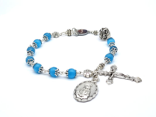 Pocket servite unique dolor rosary beads with blue glass beads and silver crucifix, medals and dolour bead.