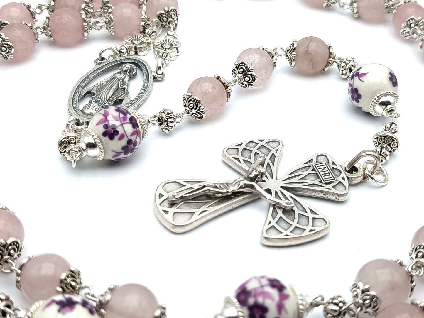 Immaculate Conception unique rosary beads with rose quartz gemstone beads, silver crucifix, porcelain pater beads and silver miraculous centre medal.