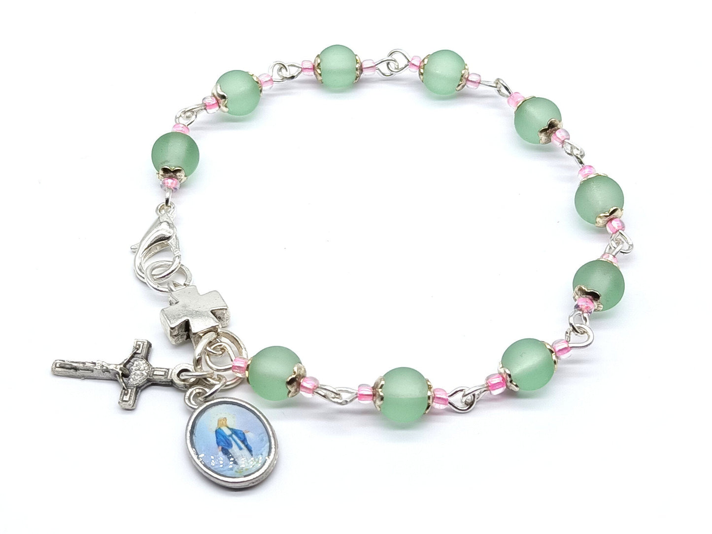 First Holy Communion unique rosary beads with green and purple glass beads, silver crucifix and chalice centre medal.