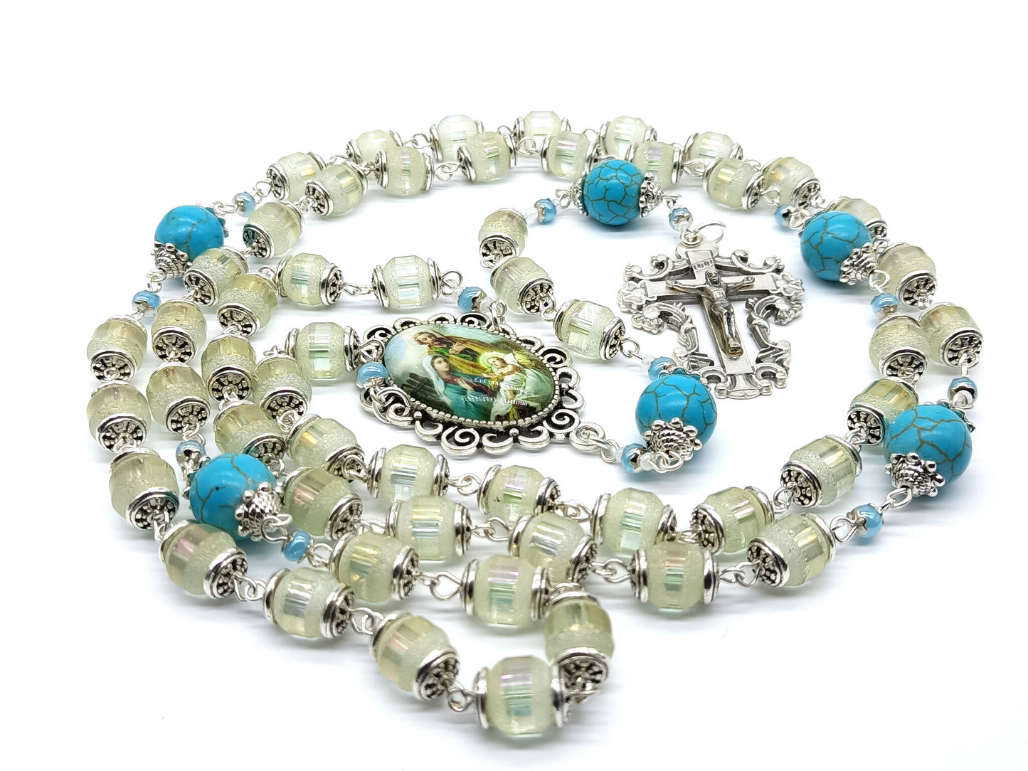 Holy Family unique rosary beads with frosted glass beads, blue gemstone pater beads, silver crucifix and picture centre medal.