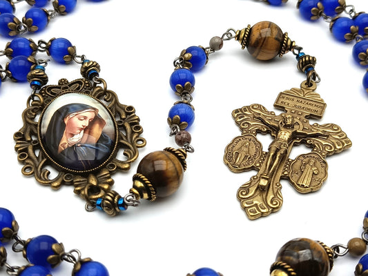 Our Lady of Sorrows unique rosary beads with blue glass and tigers eye gemstone beads, bronze pardon crucifix and picture centre medal.