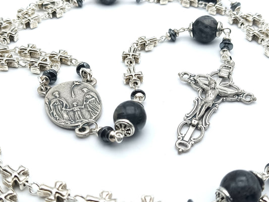 Three hearts of Jesus, Mary and Joseph unique rosary beads with metal cross beads, dark grey gemstone pater beads, silver bead caps, crucifix and centre medal.