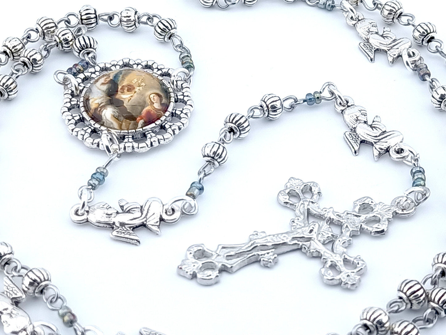 The Annunciation unique rosary beads with Tibetan silver beads, silver angel pater beads, crucifix and picture centre medal.