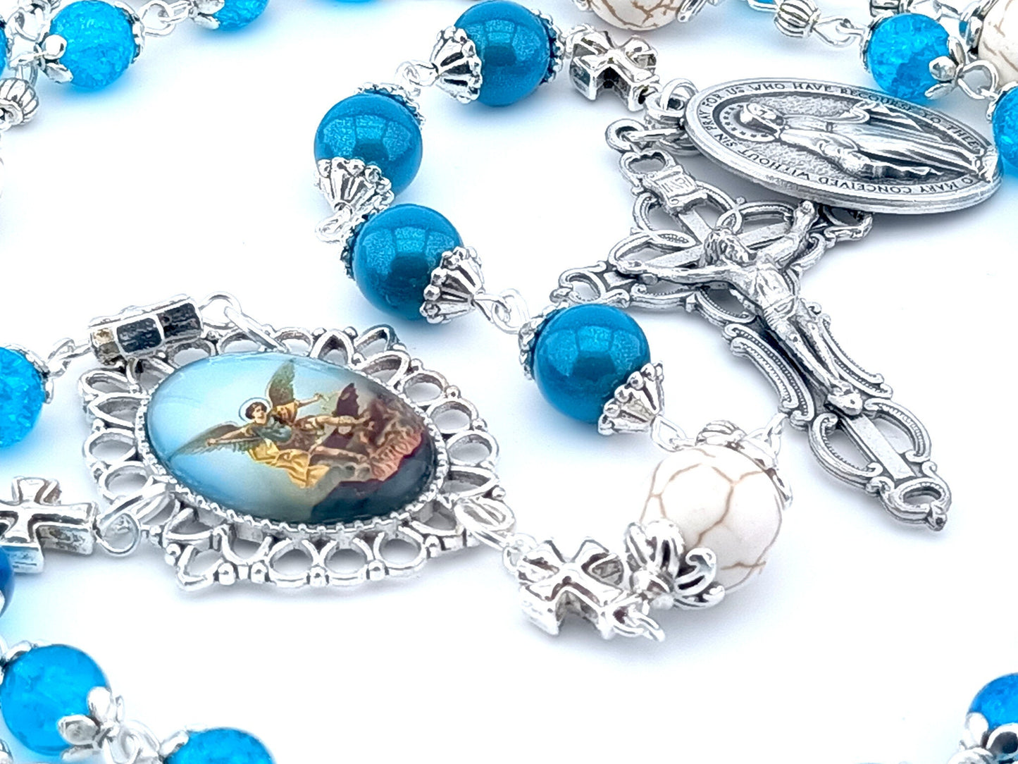 Saint Michael unique rosary beads prayer chaplet with blue glass and white gemstone beads, silver crucifix, picture centre medal and large miraculous medal.