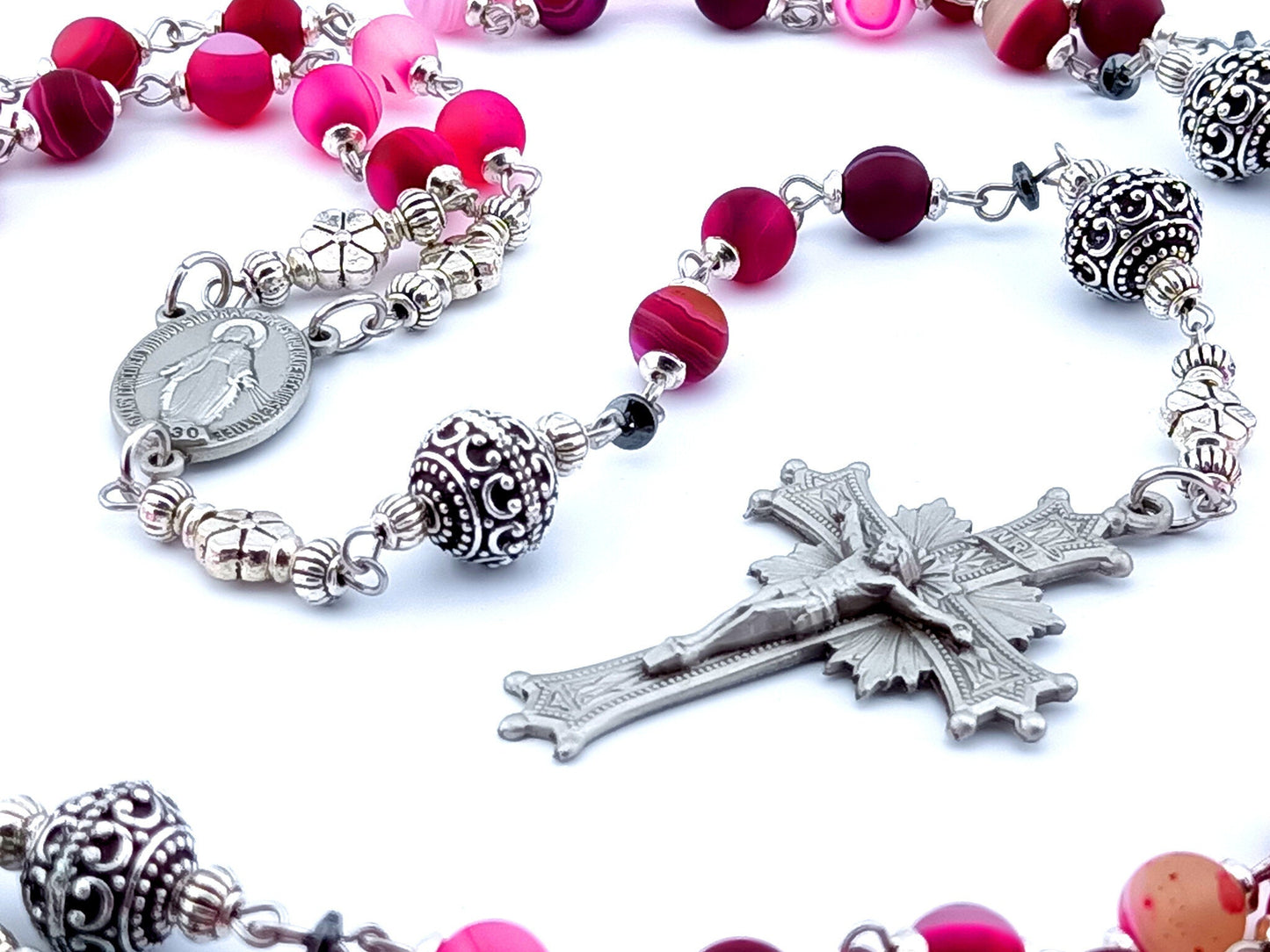 Miraculous medal unique rosary beads with purple agate gemstone beads, silver pater beads, pewter crucifix and centre medal and stainless steel wire.