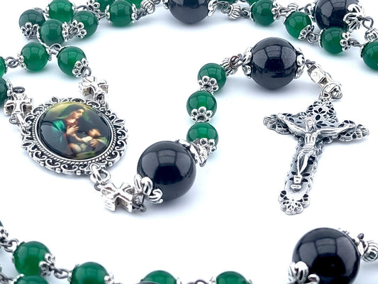 The Nativity unique rosary beads with green jasper gemstone beads, silver crucifix and picture centre medal, large garnet pater beads and silver bead caps and cross linking beads.