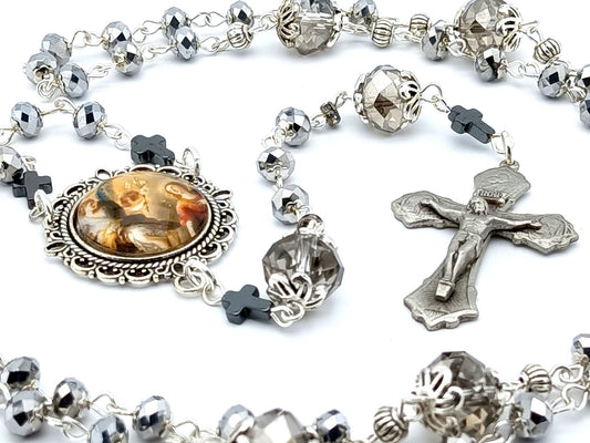The Annunciation unique rosary beads with faceted crystal beads, pewter crucifix and silver picture centre medal.