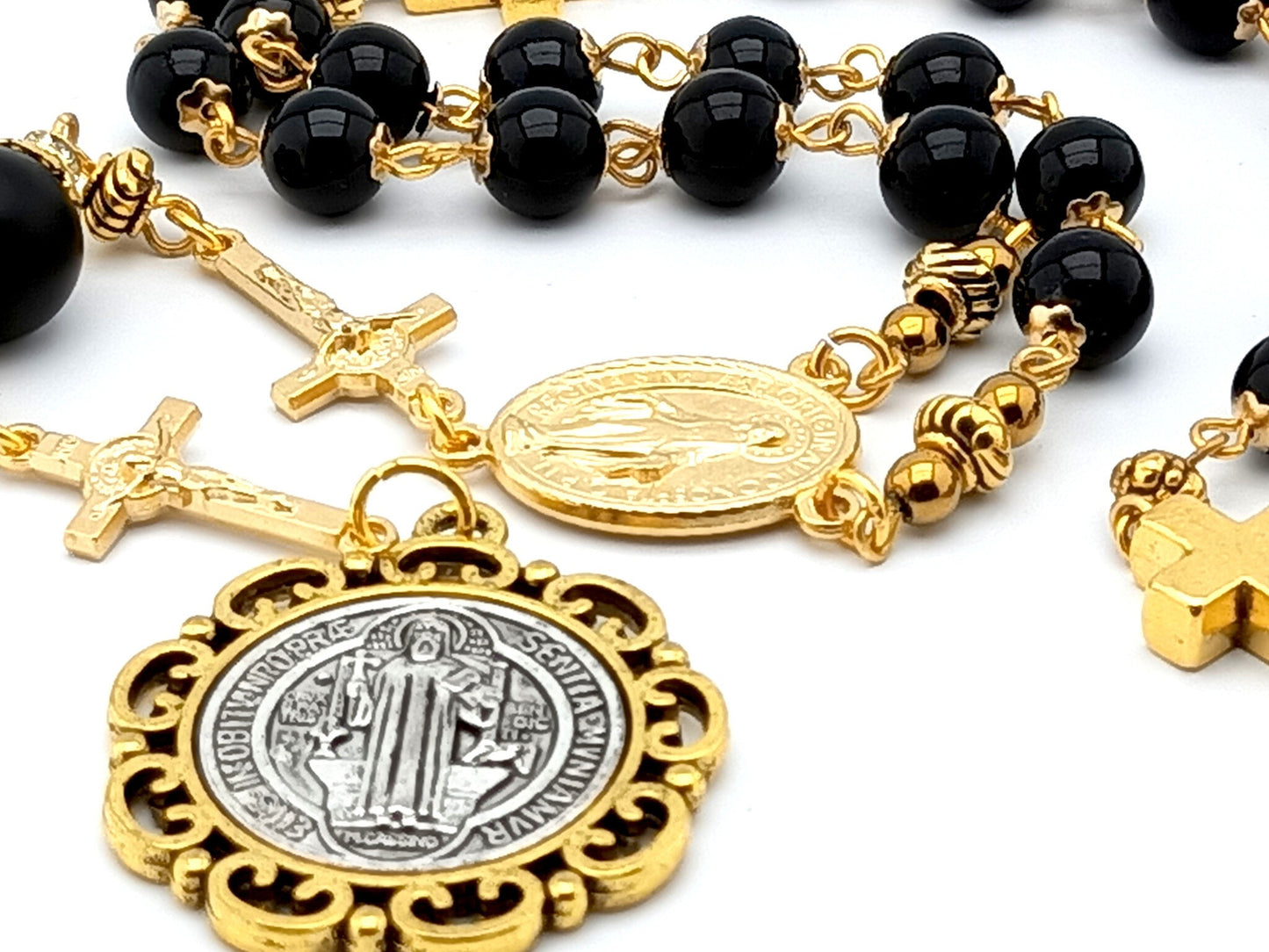 Saint Benedict unique rosary beads prayer chaplet with black and gold beads, medals and linking crucifixes.