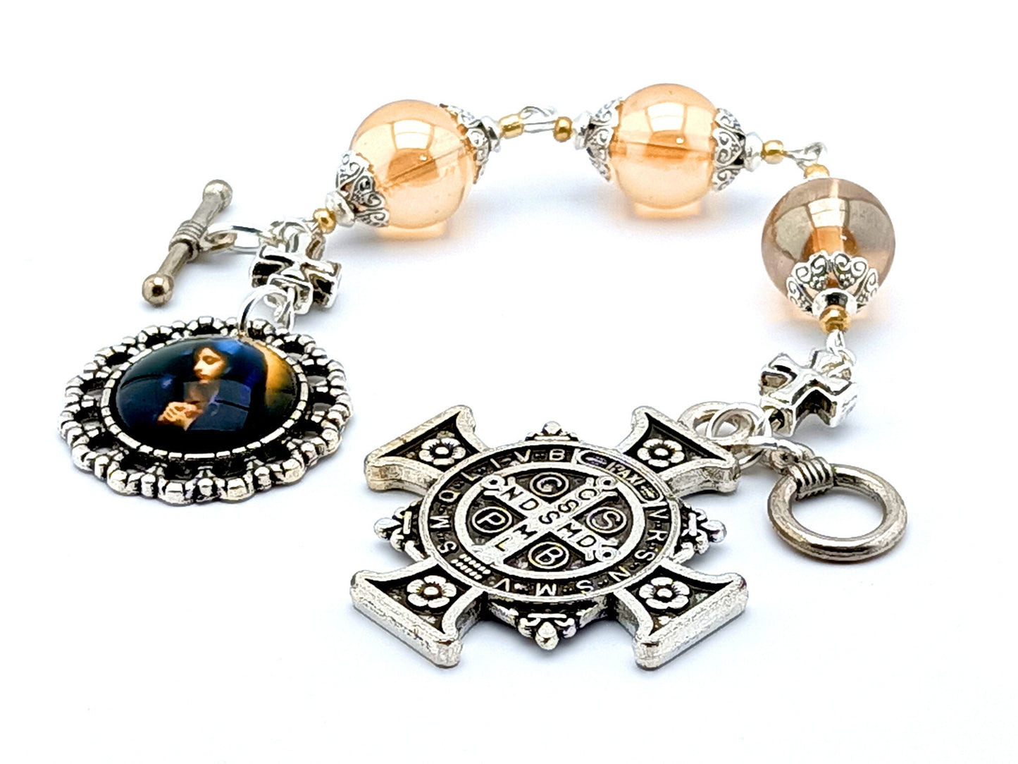 Saint Benedict cross unique rosary beads three hail Mary prayer chaplet with pale gold glass beads, silver Saint Benedict cross and Our Lady picture medal.