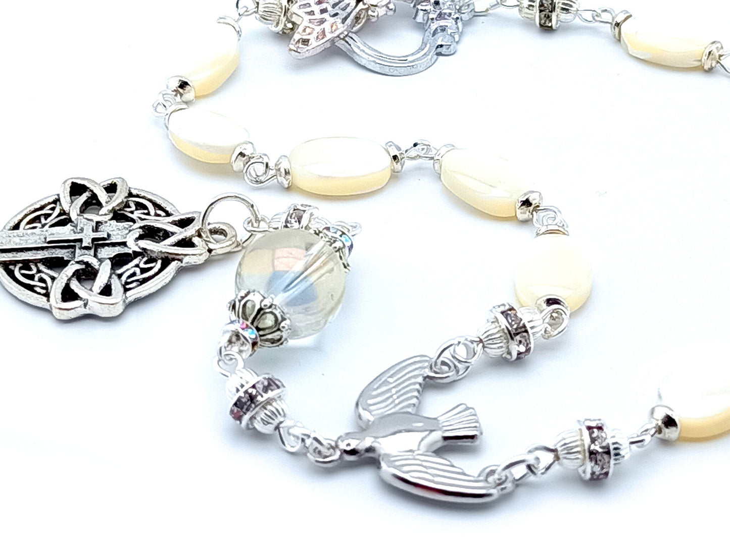 Holy Spirit unique rosary beads single decade rosary with mother of pearl beads, silver Celtic cross, Holy Spirit centre and butterfly clasp.