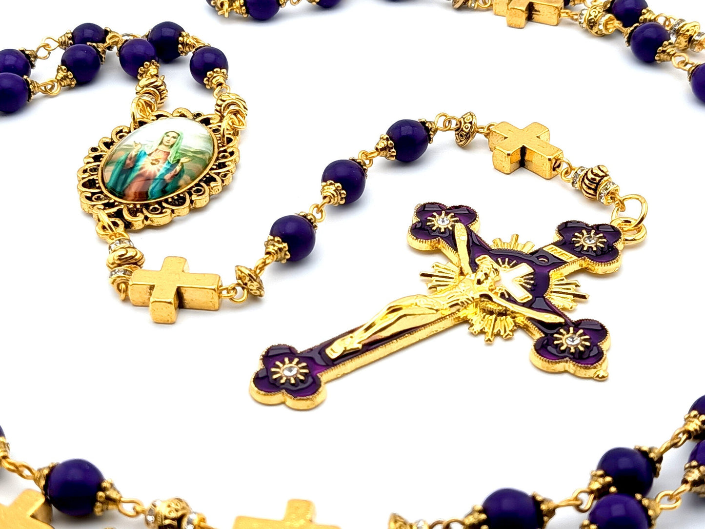 Immaculate Heart of Mary unique rosary beads with purple gemstone beads, golden cross pater beads, picture centre medal and crucifix.