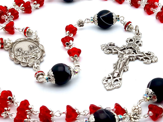 The Nativity unique rosary beads with red tulip glass and onyx beads, silver filigree crucifix and centre medal.