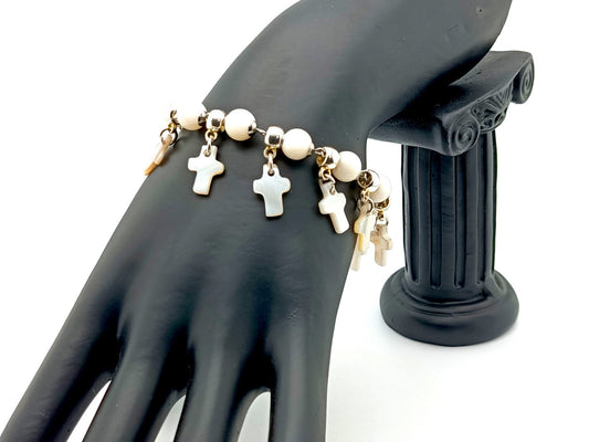 First Holy Communion unique rosary beads bracelet with mother of pearl beads and crosses, small crucifix and chalice medal.