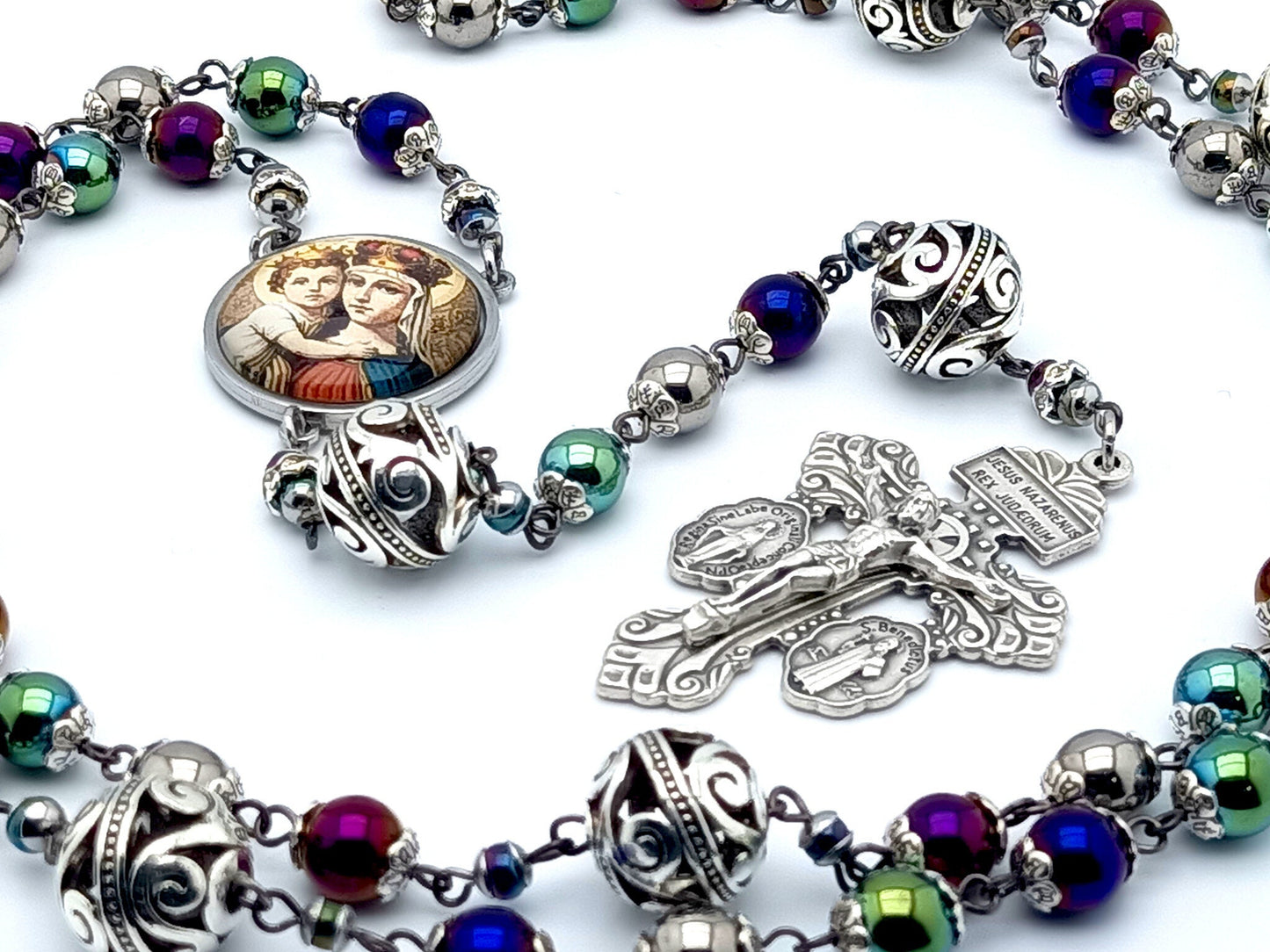 Our Lady Helper of Christians unique rosary beads with multi coloured hematite and silver beads, silver pardon crucifix and stainless steel picture centre medal.