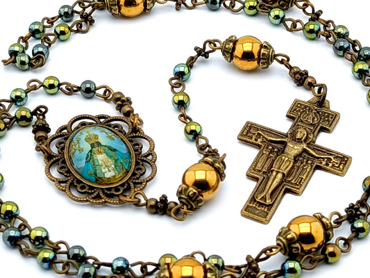 Our Lady of Charity unique rosary beads with blue gree and gold gemstone beads, bronze Saint Francis of Assisi crucifix and picture centre medal.