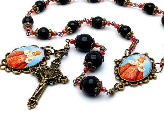 infant of Prague unique rosary beads prayer chaplet with onyx gemstone and red glass beads, brass crucifix and picture centre and end medals.