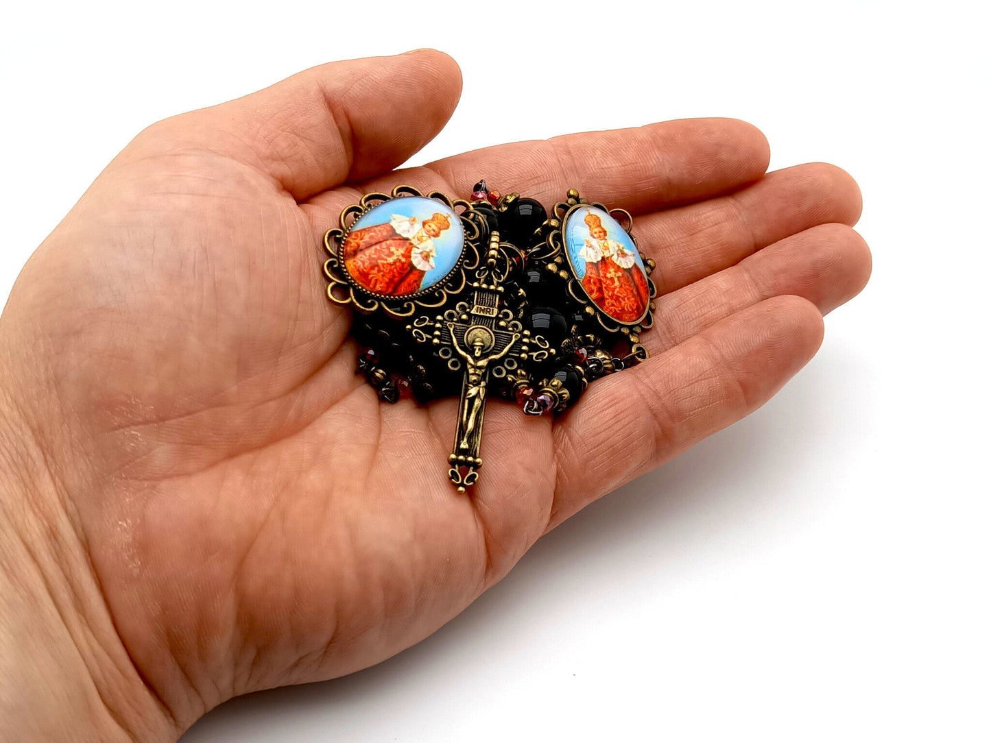 infant of Prague unique rosary beads prayer chaplet with onyx gemstone and red glass beads, brass crucifix and picture centre and end medals.