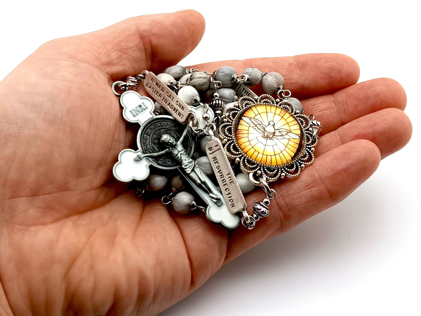 Holy Spirit unique rosary beads with jobs tears and mysteries of the rosary linking beads, white enamel crucifix and picture centre medal.