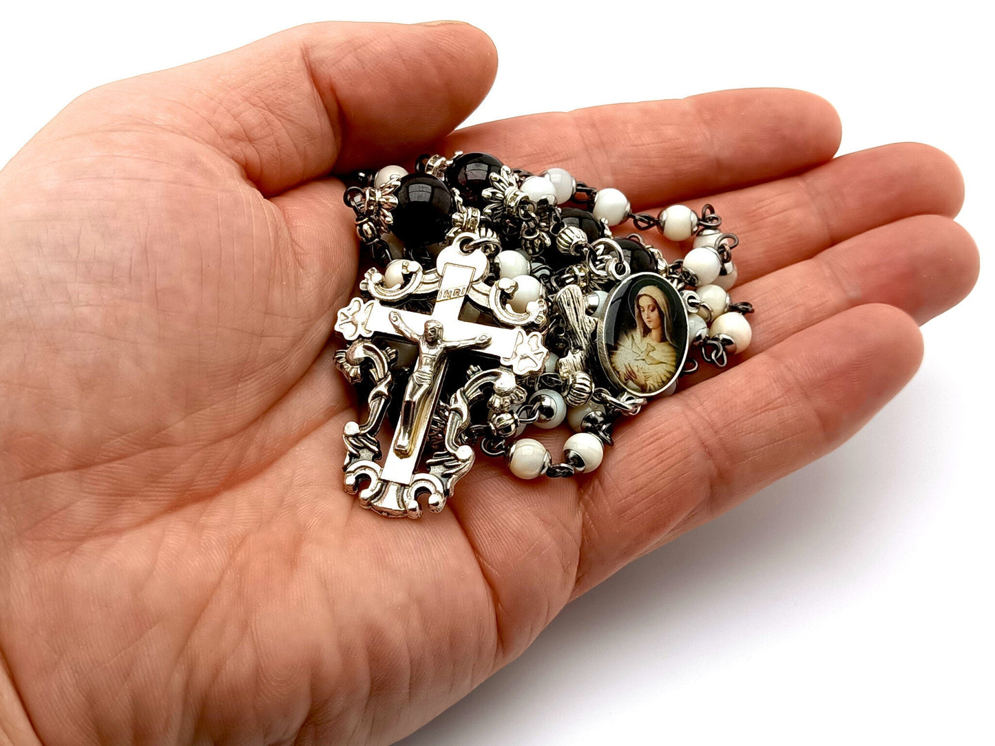 Virgin Mary unique rosary beads and Holy Spirit mother of Pearl and onyx gemstone rosary beads with filigree silver crucifix.