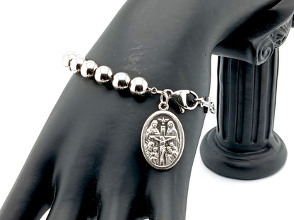 Holy Trinity unique rosary beads single decade rosary bracelet with stainless steel beads, cross and clasp and sterling silver belcher chain.